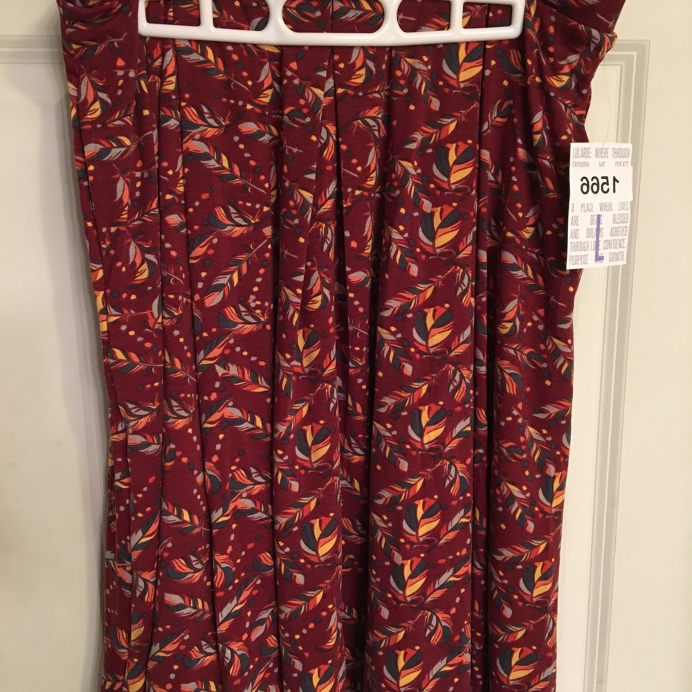 Lularoe Madison L with feathers and POCKETS!!